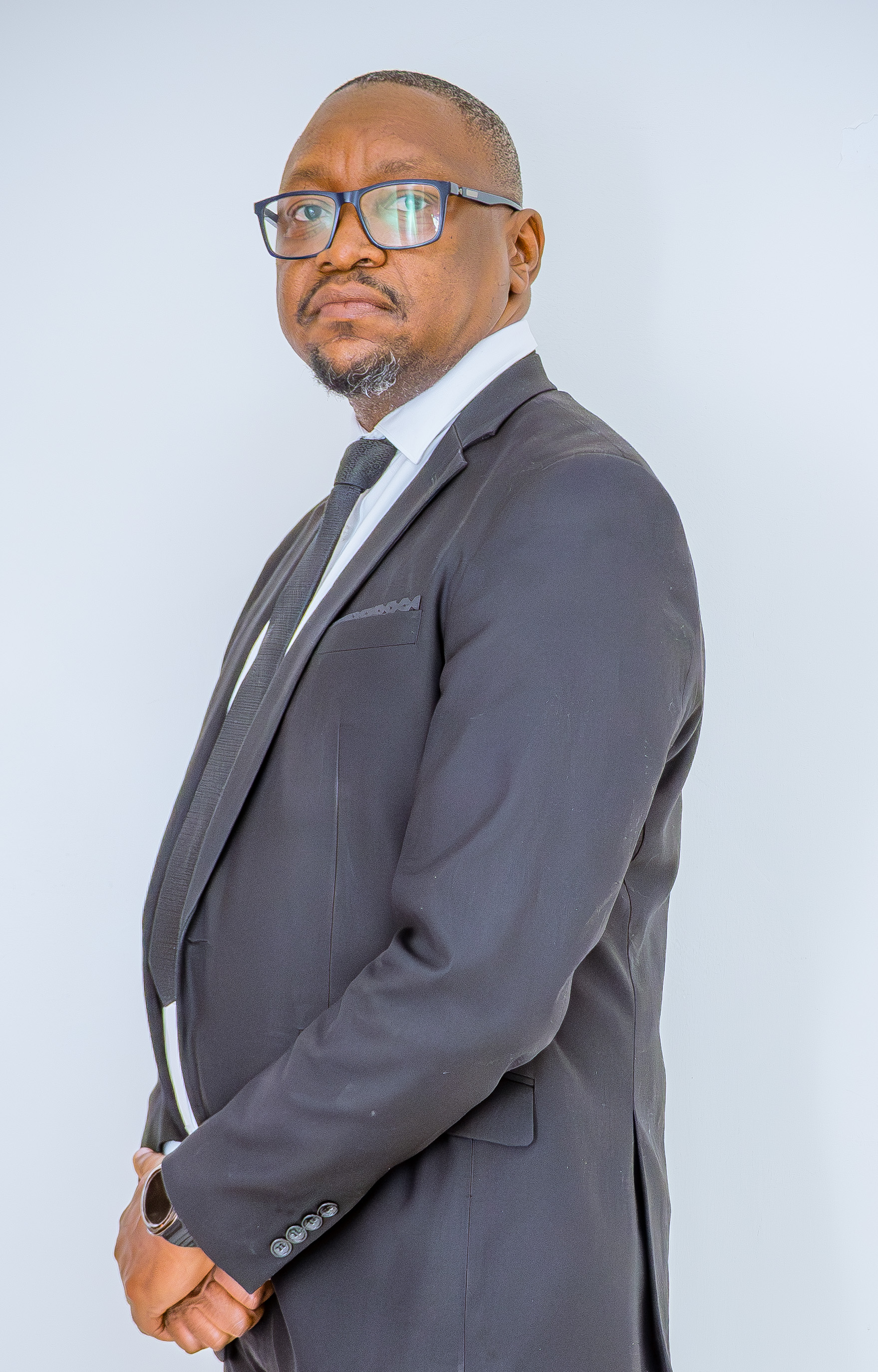 Mr. Martin L. Rugarabamu